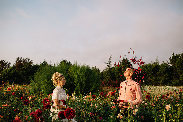 Happy couple in the flowers